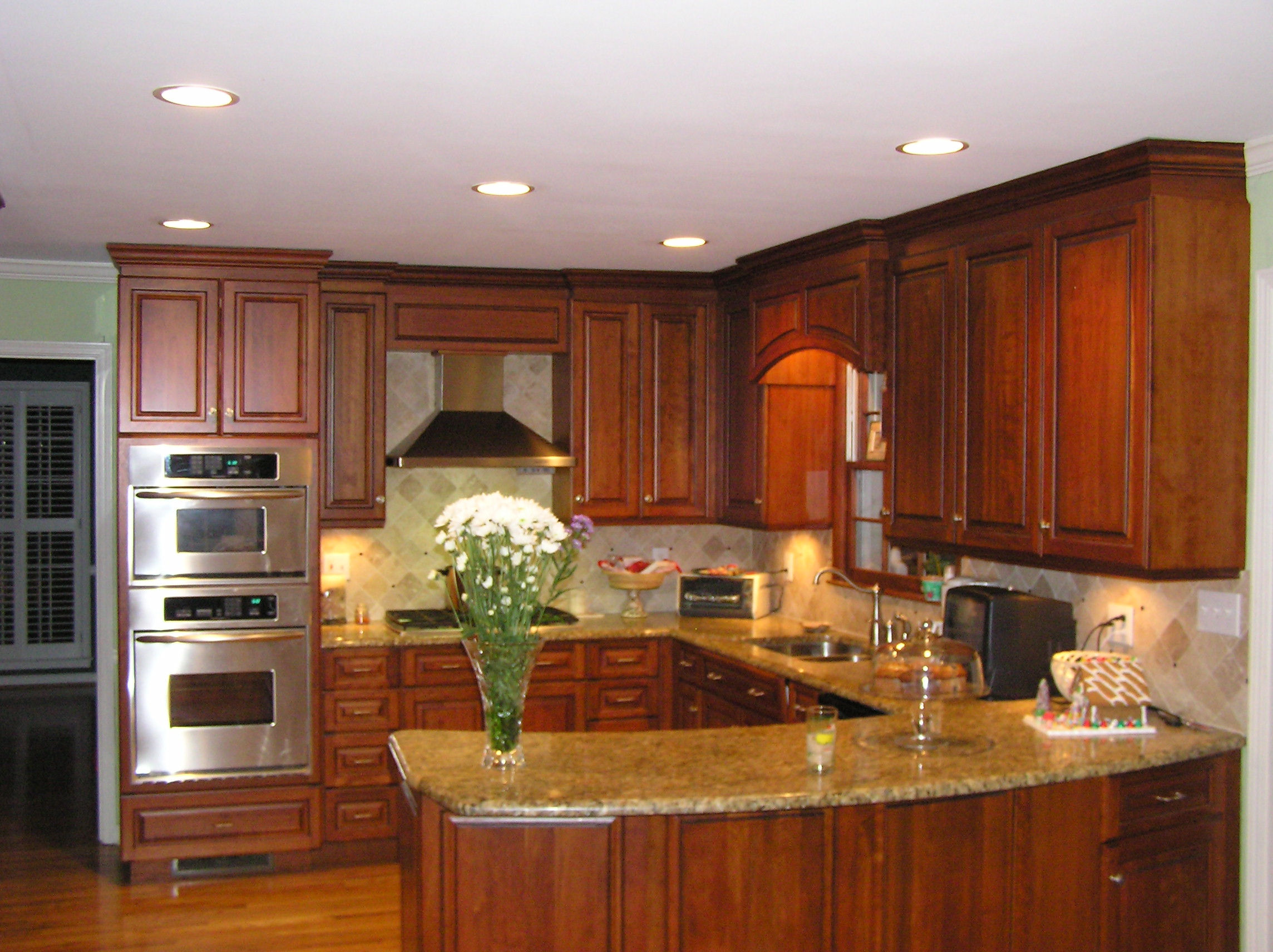 Kitchen cherry wood with curved peninsula Creative
